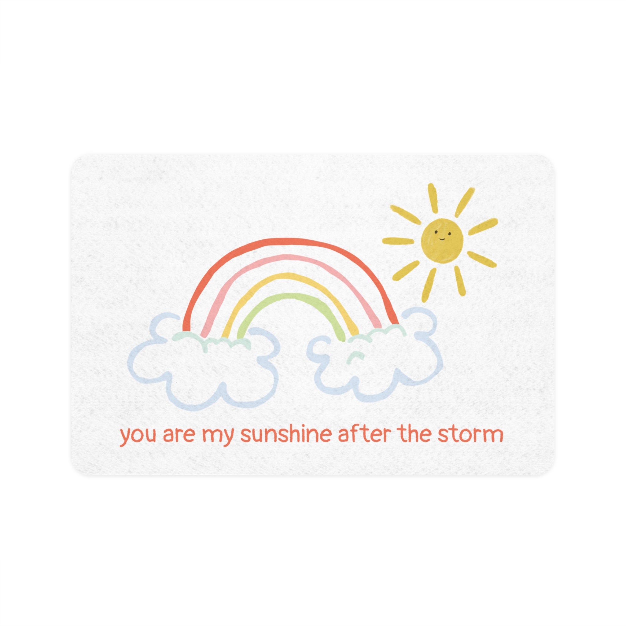 Cartoon sun, rainbow, and clouds with 'you are my sunshine after the storm' text on a white pet mat