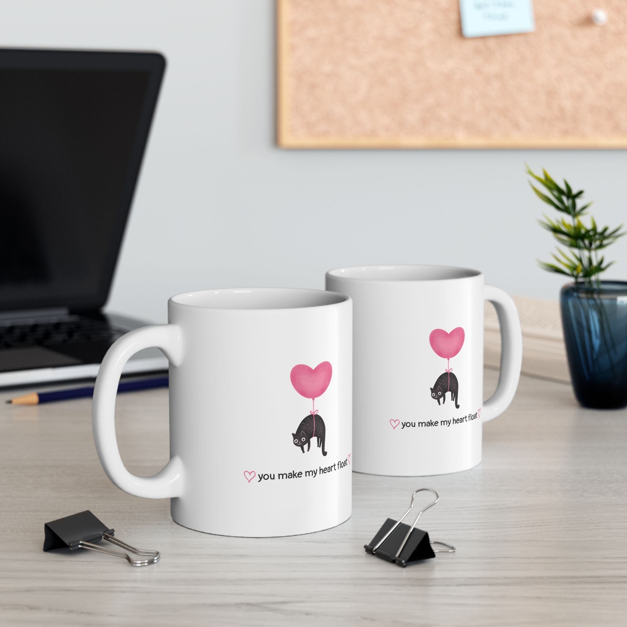 Two cat lover mugs on desk side by side