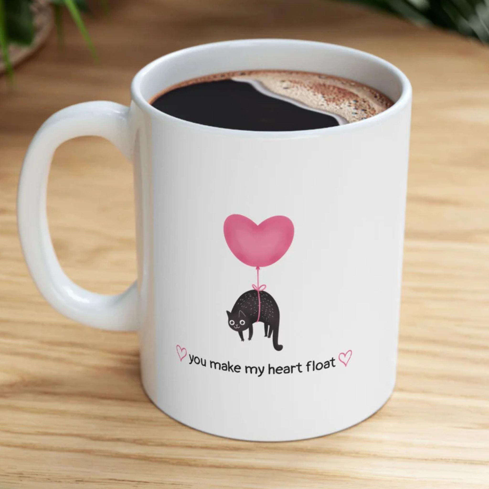 You make my heart float white ceramic mug zoomed in